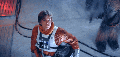 Luke Skywalker Gif looking up and smiling.