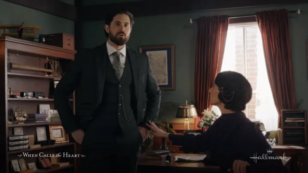 Heartfelt Encounter: A man in a formal suit engages attentively with a woman seated behind a desk, her expression reflecting a mix of apprehension and resolve, suggesting a significant dialogue about to unfold.