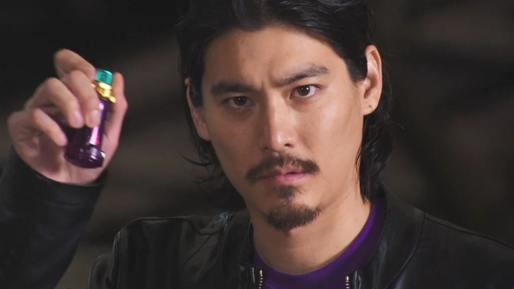 Gentoku Himuro from Kamen Rider Build, holding a transformation device, looking serious and determined, wearing a black leather jacket.