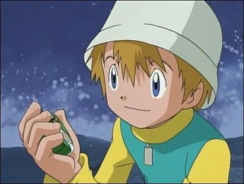 T.K. from Digimon rocking a bucket hat, the perfect playful accessory for any '90s adventure. '90s Geek Fashion
