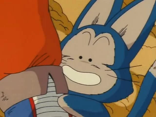 Puar’s mischievous charm adds a comedic twist to Yamcha’s serious demeanor in Dragon Ball Episode 5. Watch the reaction now on All Ages of Geek!