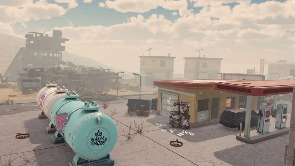 A sunlit, post-apocalyptic gas station scene with a weathered fuel tank tagged “Goblin Mode” and graffiti-streaked barrels scattered nearby. The cracked pavement and abandoned buildings in the background evoke a forgotten, rugged town overtaken by chaos. The faded, dusty atmosphere combined with desolate surroundings makes this setting feel perfect for Grumble’s unpredictable goblin battles.