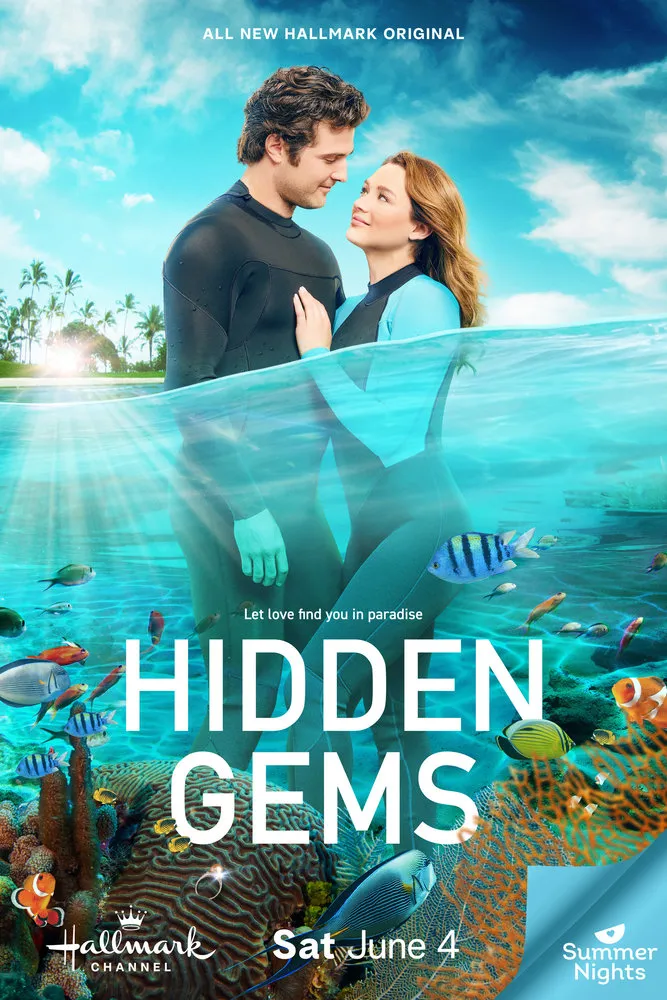 The image is a poster for the Hallmark movie Hidden Gems. It features the two main characters standing in shallow ocean water, both wearing sleek black-and-blue wetsuits. They're gazing into each other's eyes with soft smiles, radiating that classic romantic vibe. The background transitions seamlessly from the lush green palm trees onshore to the vibrant underwater world below. Colorful coral, tropical fish, and a crystal-clear ocean fill the lower half, creating a dreamy, paradise-like setting. The tagline reads, "Let love find you in paradise," tying it all together with Hallmark's signature charm.