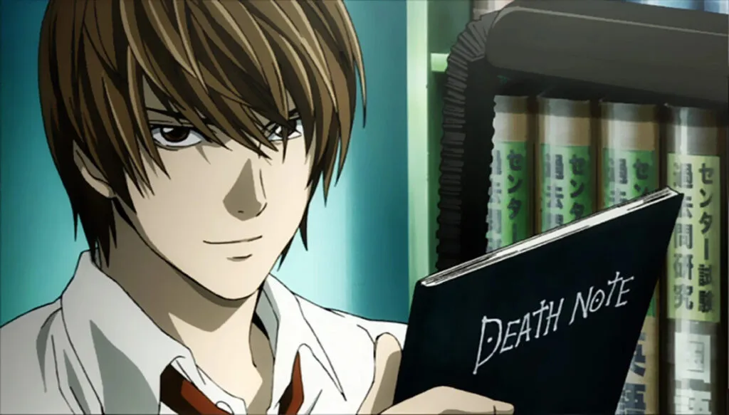 Light Yagami holding the Death Note.
