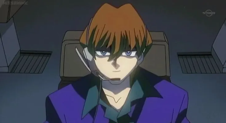 Seito Kaiba looking at computer screen.