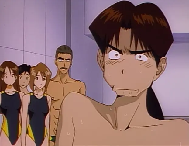Anime scene from "Golden Boy" showing a shocked male character sweating nervously in a locker room, with several swimmers and a stern coach standing in the background.