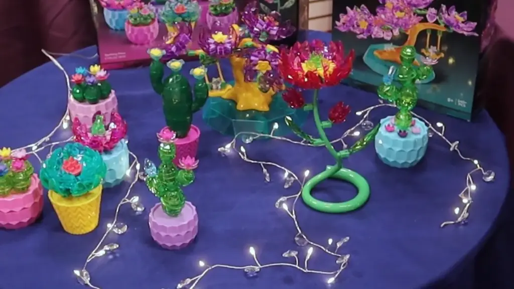 Cra-Z-Art Crystal Gem Creations display featuring bright gem-themed botanical builds like lotus flowers, succulents, and bonsai trees at Toy Fair NY 2025.