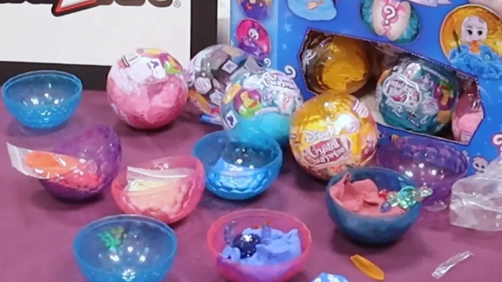 Disney Crystal Surprise blind box toys displayed at Toy Fair NY 2025, featuring colorful collectible spheres filled with characters, slime, and themed accessories from Cra-Z-Art.