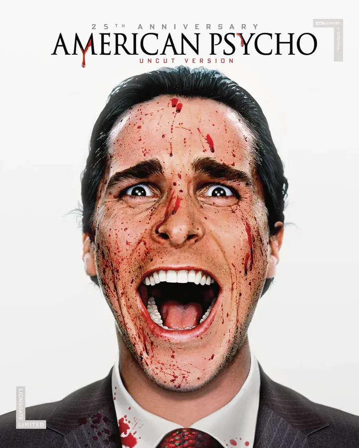 Cover art for the 25th Anniversary uncut version of American Psycho, featuring Christian Bale as Patrick Bateman with blood spattered across his face and suit, screaming with a wide open mouth.