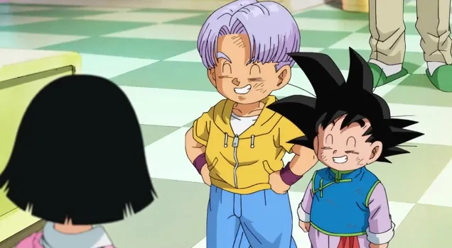 Trunks and Goten standing side by side in a bright kitchen, both smiling proudly with their hands on their hips as they face Videl, looking pleased with themselves.