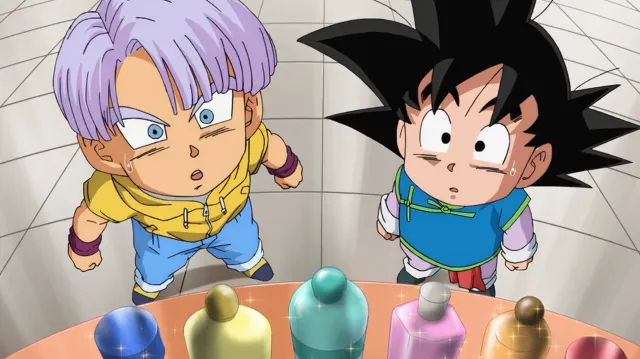 Trunks and Goten looking up in surprise at a table filled with colorful bottles, their faces wide-eyed as they stand side by side from a top-down view.