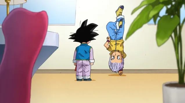 Trunks balancing upside down on his hands while Goten stands in front of him watching, inside a bright room with plants and furniture in the background.