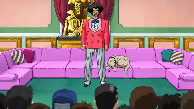Mr. Satan standing in front of a pink couch during a press event, wearing a bright suit while reporters watch, with his small dog sleeping beside him and a golden statue behind him.