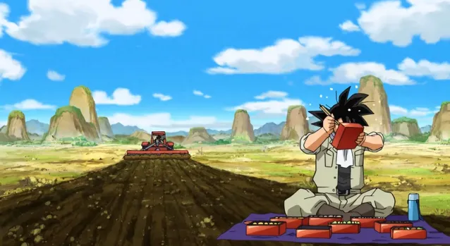 Goku sitting on a mat in the middle of a farm field, eating from a lunchbox while wearing work clothes, with a tractor and freshly plowed soil behind him under a bright blue sky.